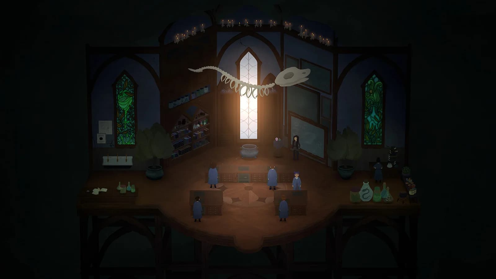 A classroom with seats and a large winged skeleton overhead
