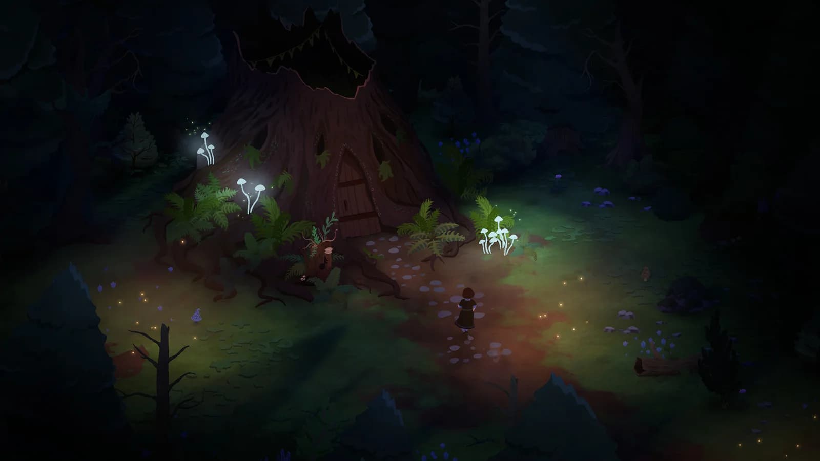 A woodland clearing lit by small glowing lights at night
